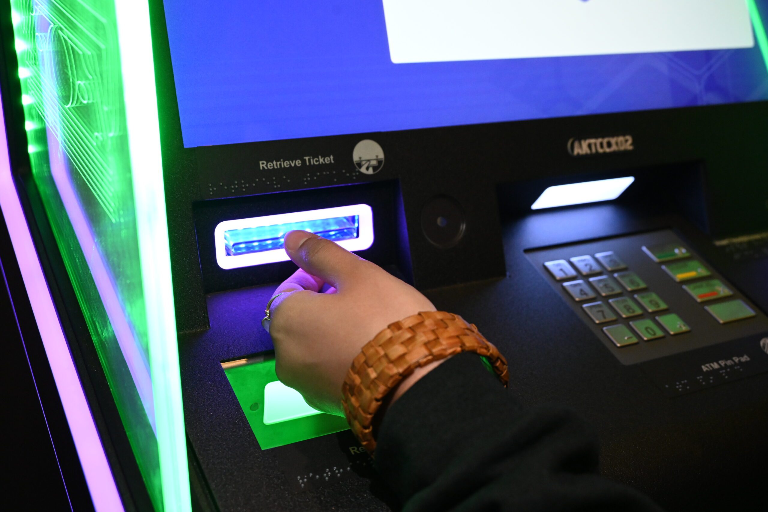 Guest playing an electronic gaming machine at Two Coppers Casino in Juneau, Alaska.